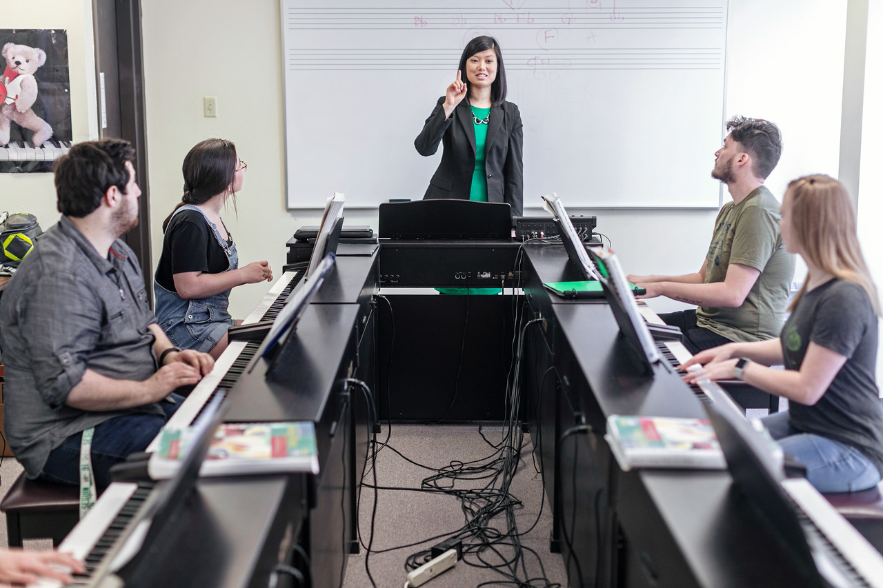 Prof. Mary Chung teaches piano students