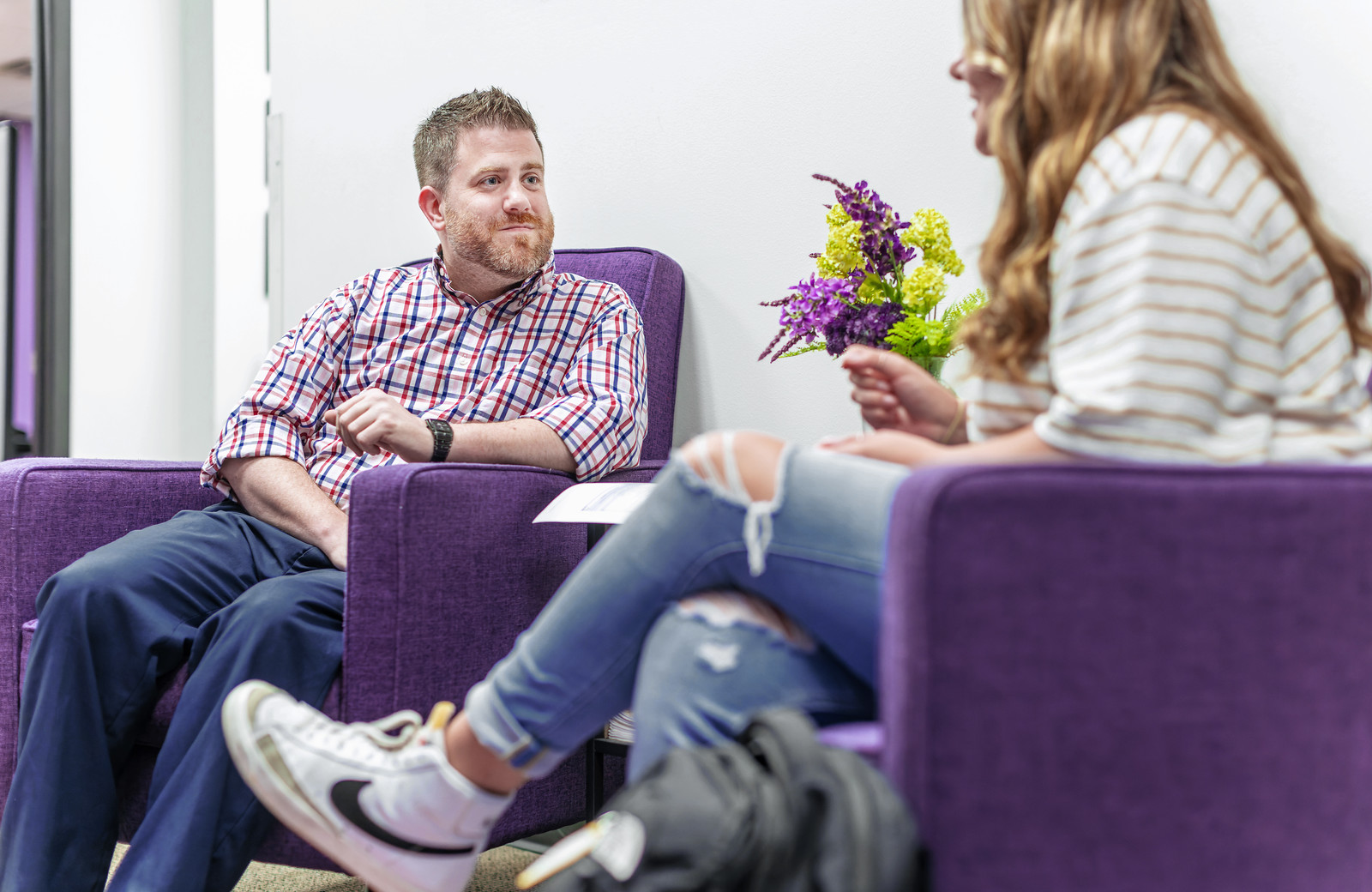 students sitting in chairs